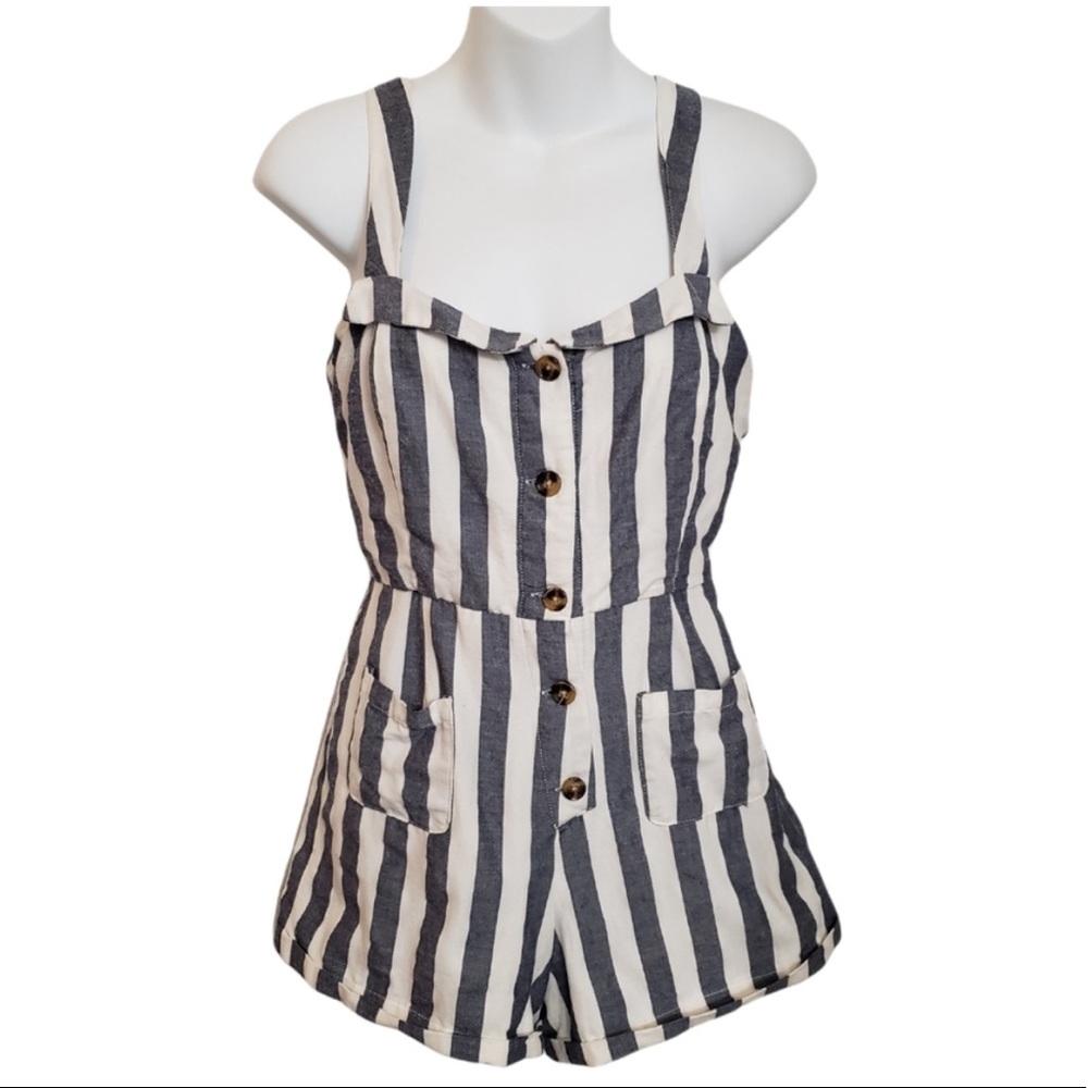 Never worn romper size large. Dress forum brand.